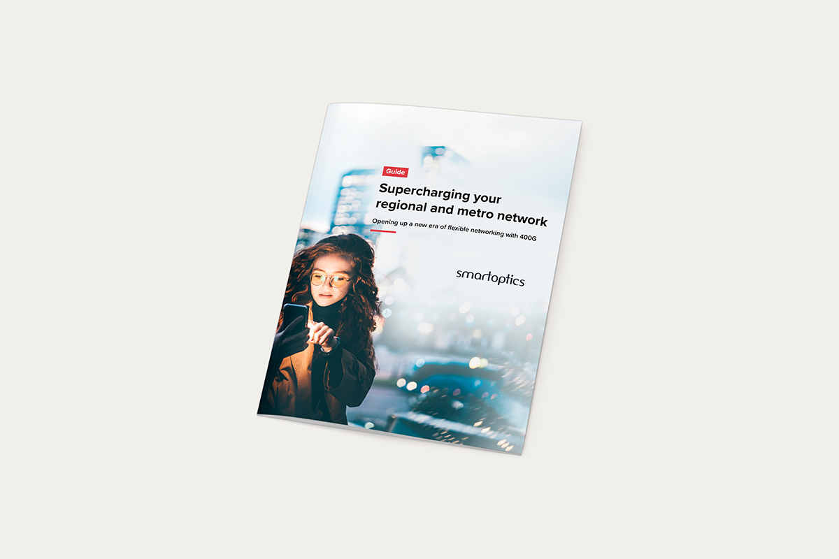 A brochure titled "Supercharging your regional and metro network" by Smartoptics, featuring a woman using a smartphone.
