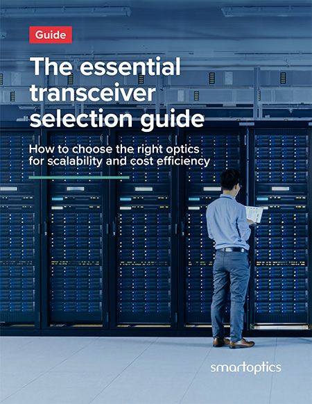 Man reading paper in front of server racks, text overlay about transceiver selection guide, Smartoptics branding.