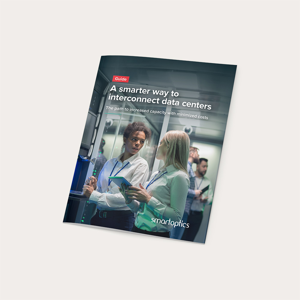 Brochure titled "A smarter way to interconnect data centers" with people working in a server room.